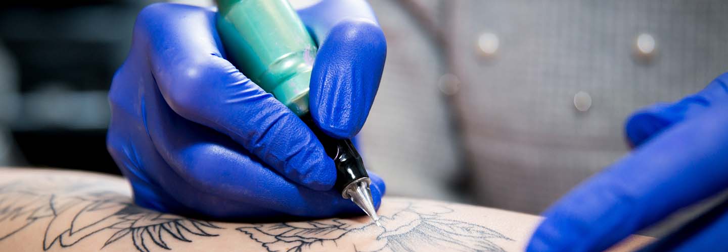 Tasker performing a Tattoo Artists job.